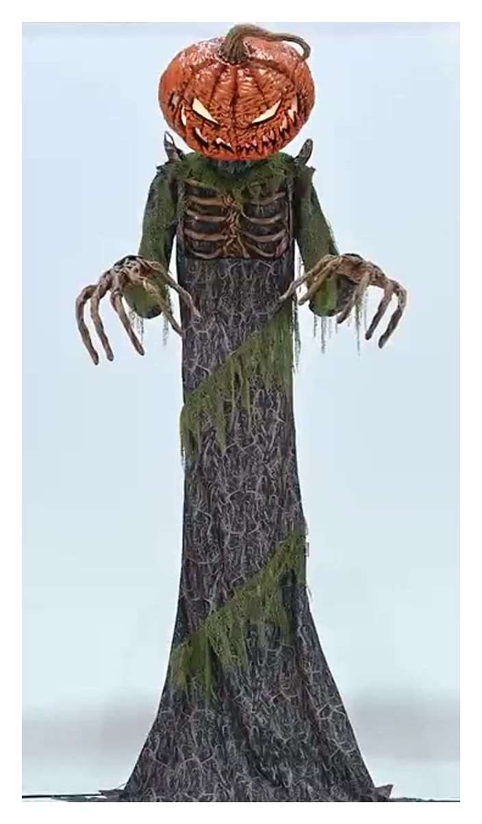 Animated pumpkin-head reaper standing figure