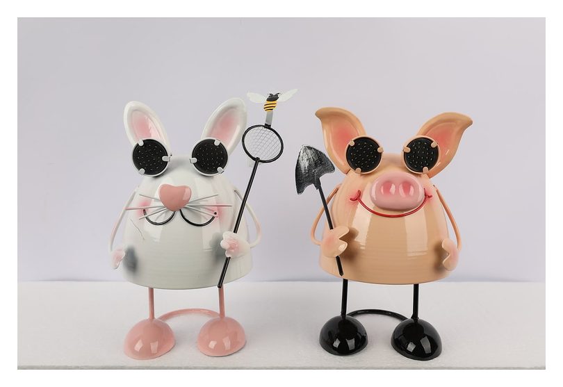 Rabbit and pig gardener figures, pair